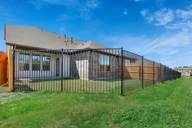 a view of a backyard with a garden