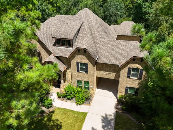 $974,995 | 11306 Longmire Creek Court, Conroe, TX 77304