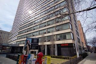 2930 North Sheridan Road, Unit 1801 Chicago, IL 60657 - Photo 1 of 1 a front view of a building with street view