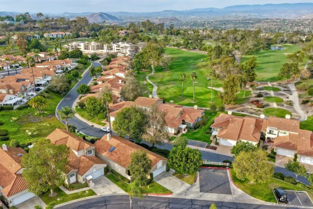 a view of a park with swings
