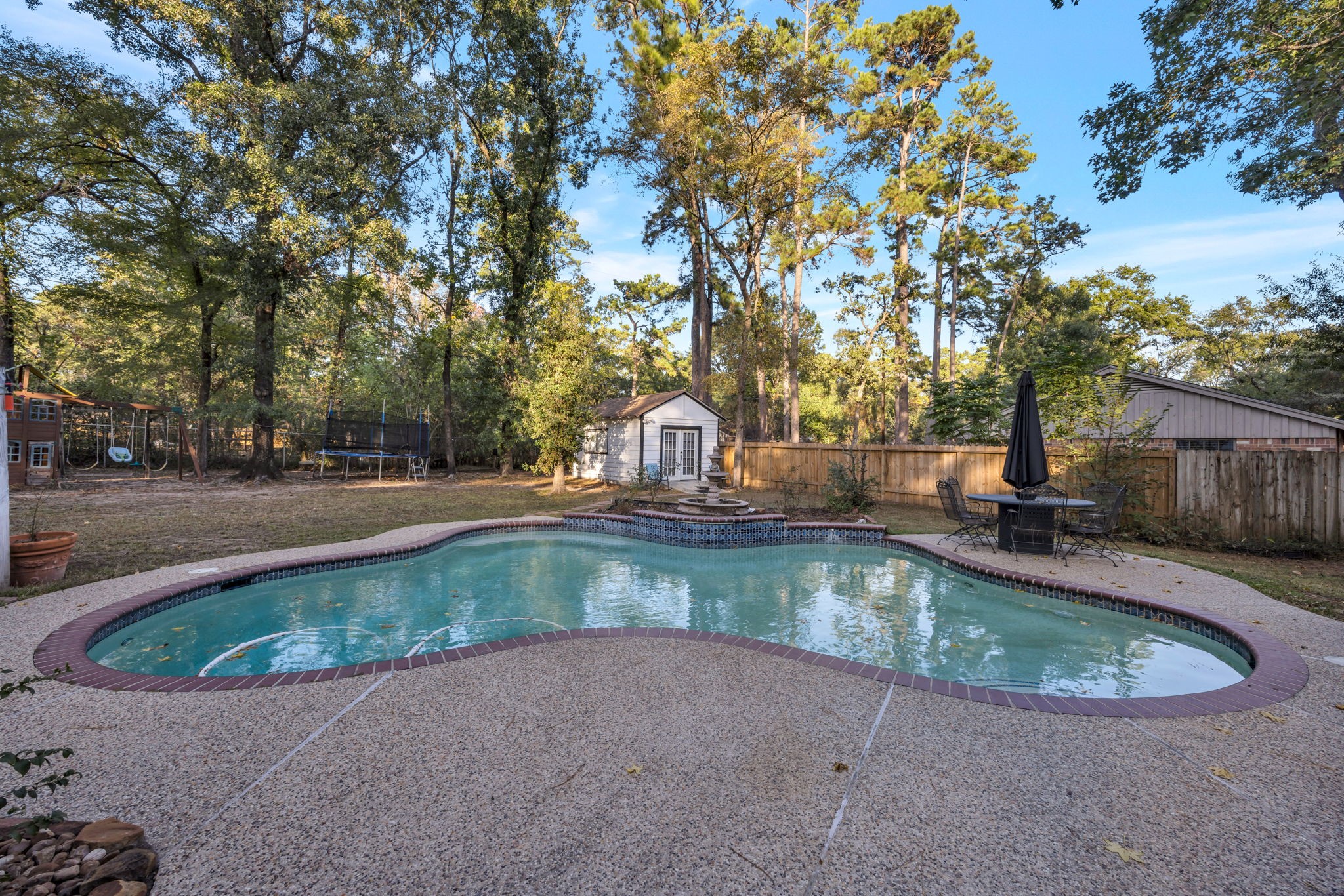 127 Sagewood Drive Spring, TX 77386 - Photo 17 of 18 a view of a swimming pool with a yard