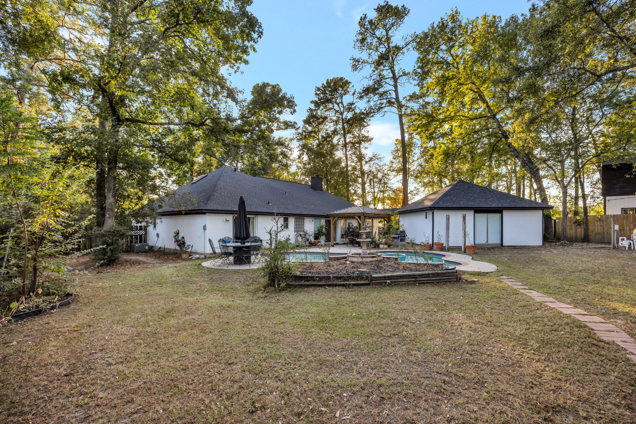 127 Sagewood Drive Spring, TX 77386 - Photo 18 of 18 a view of a house with a yard and sitting area