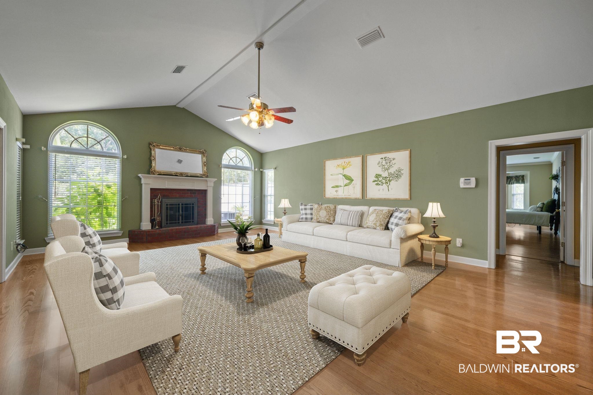 5618 Leytham Road Theodore, AL 36582 - Photo 11 of 60 Living room with a fireplace, vaulted ceiling, hardwood / wood-style floors, and ceiling fan