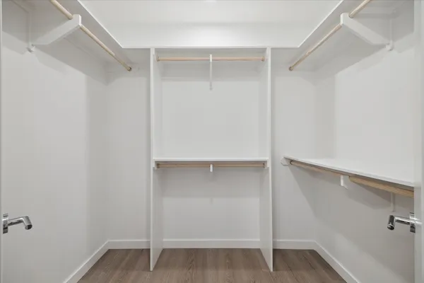 a view of an empty walk in closet