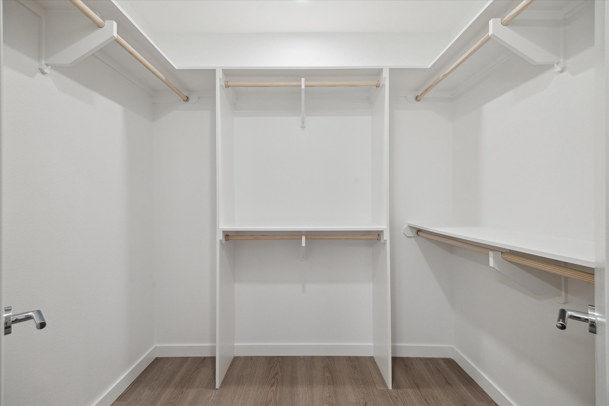 1 Riva Row, Unit 167 The Woodlands, TX 77380 - Photo 12 of 49 a view of an empty walk in closet