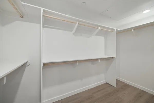 a view of an empty walk in closet