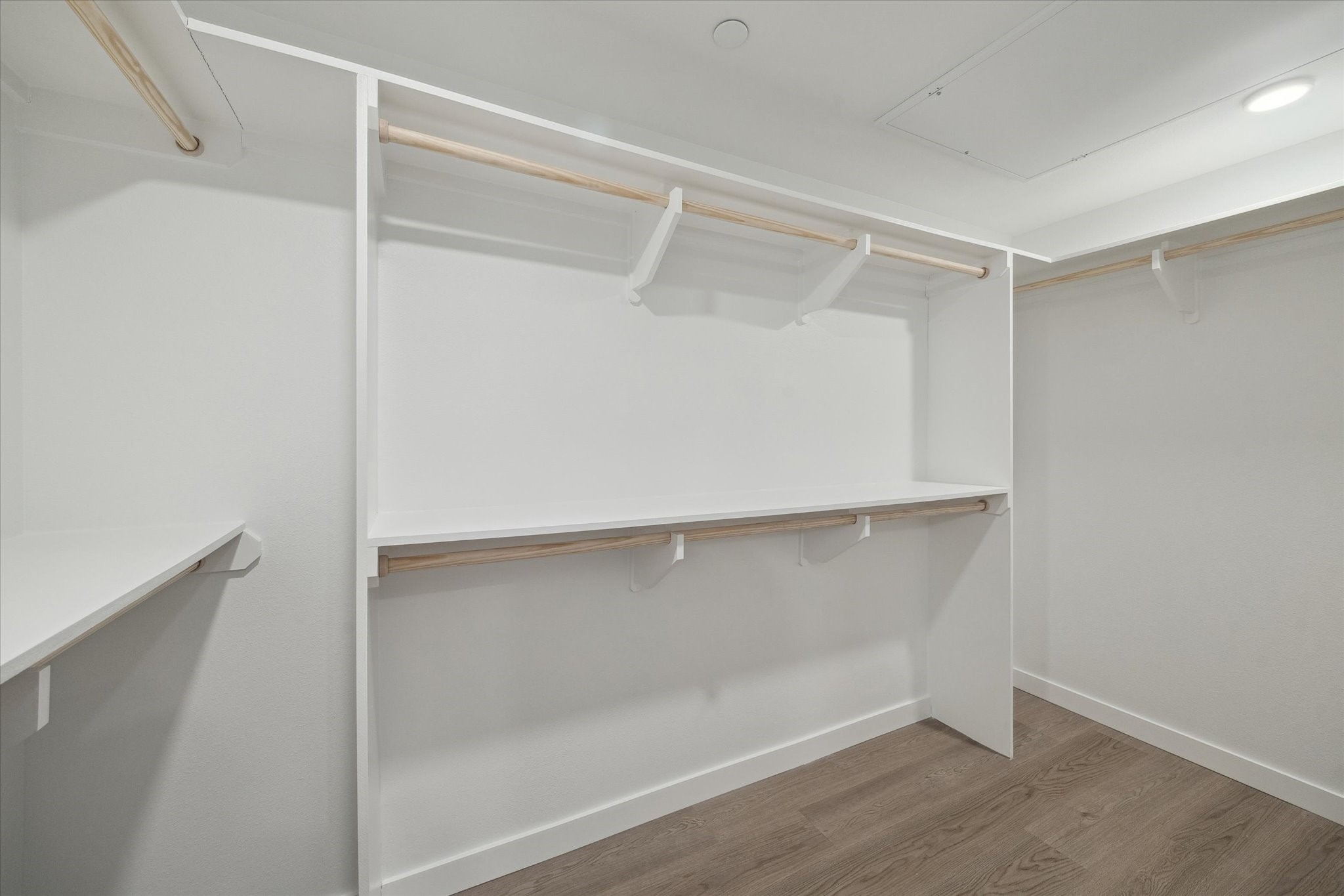 1 Riva Row, Unit 167 The Woodlands, TX 77380 - Photo 17 of 49 a view of an empty walk in closet