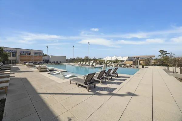 a view of a terrace with chairs