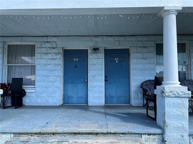 a brick building with couches