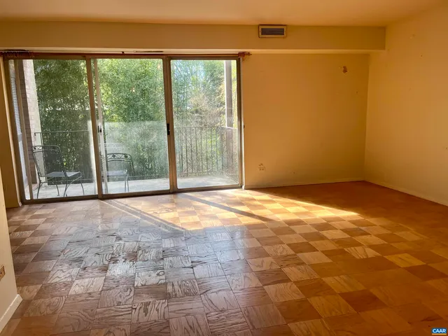 a view of an empty room and window