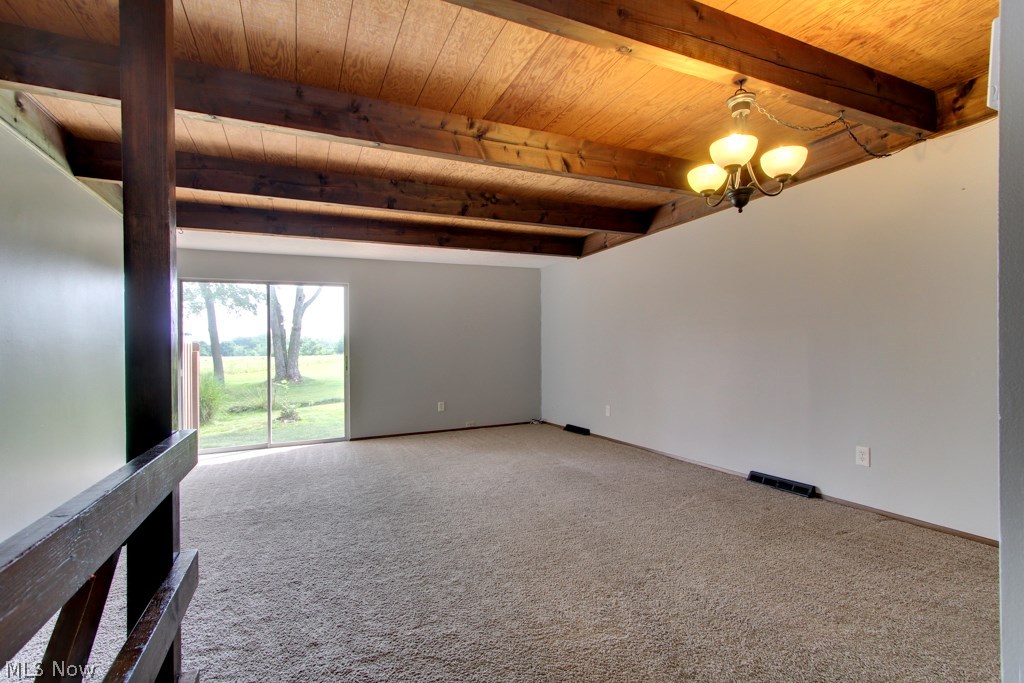 5221 Cline Road, Unit D Kent, OH 44240 - Photo 7 of 18 Fresh neutral paint throughout. Great room boasts beautiful wood beams, plenty of wall space and natural light with unobstructed views.