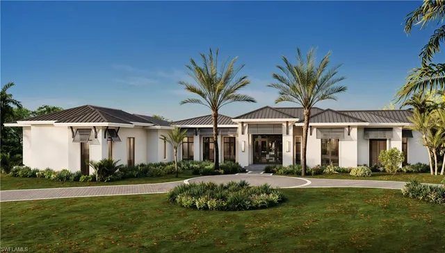 a front view of a house with a garden and plants