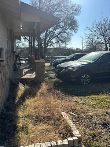 a view of a yard with an outdoor space