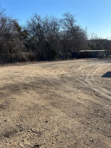 a view of outdoor space with swimming pool and trees