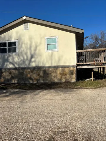 a view of front door and deck