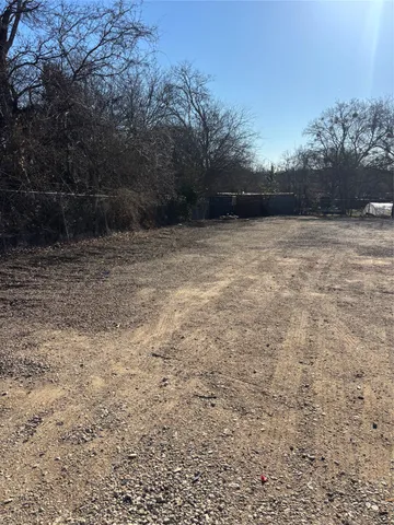 a view of backyard with green space