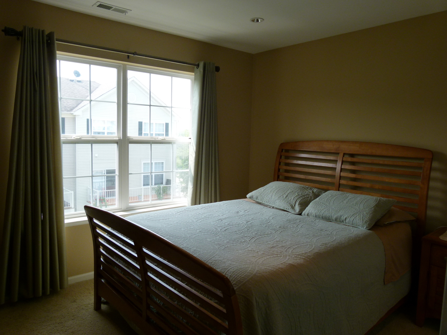 116 Jackson Street Gilberts, IL 60136 - Photo 11 of 19 a bedroom with a bed and a window