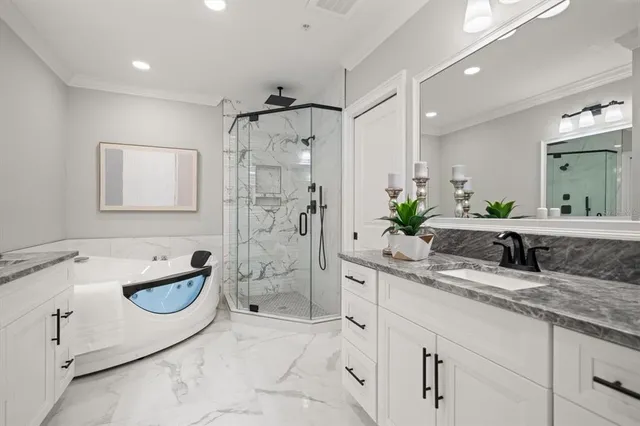 a bathroom with a granite countertop sink a toilet and mirror