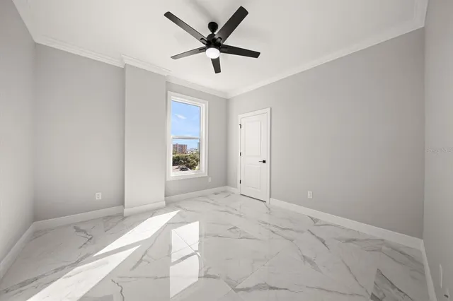 a utility room with granite countertop cabinets washer and dryer