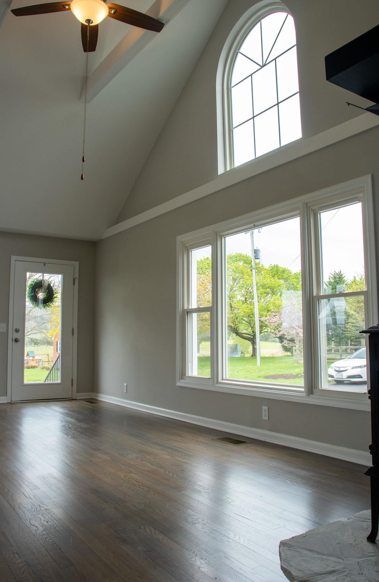 4284 Rockfish Road Grottoes, VA 24441 - Photo 8 of 48 a view of an empty room with wooden floor and a window