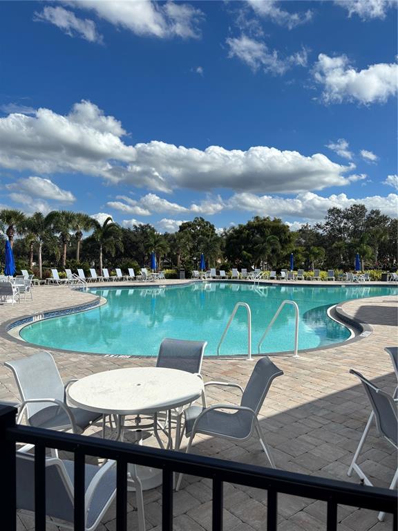 7892 Farina Court Sarasota, FL 34238 - Photo 32 of 41 a view of outdoor space yard swimming pool and green