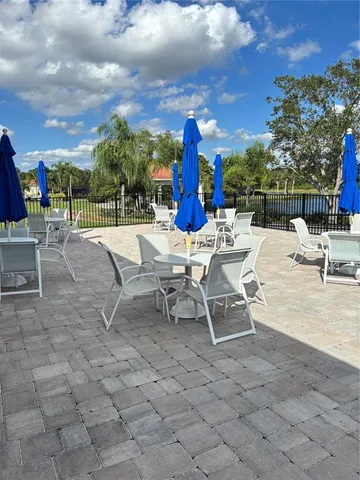 a view of a park with swings and slides