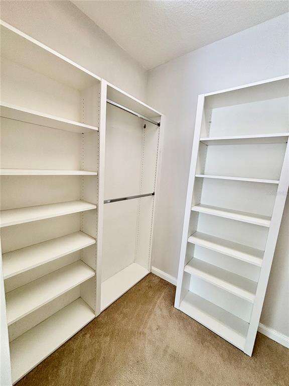 7892 Farina Court Sarasota, FL 34238 - Photo 8 of 41 a view of walk in closet with empty racks