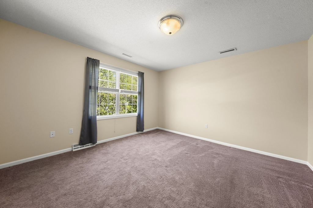 1507 East Mountain Road Westfield, MA 01085 - Photo 30 of 42 an empty room with windows