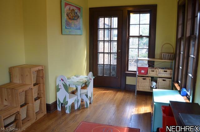 2945 Eaton Road Shaker Heights, OH 44122 - Photo 6 of 25 1st floor sun room or private office with wood floor and door leading rear yard.