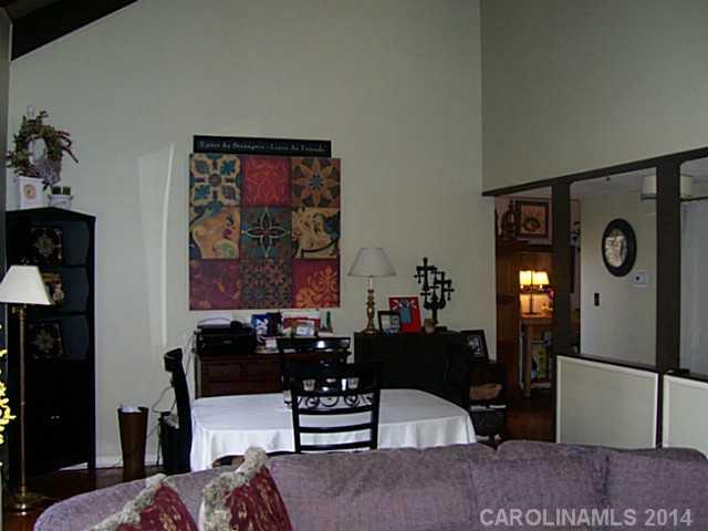 4723 Rounding Run Road, Unit 5 Charlotte, NC 28277 - Photo 3 of 12 a living room with furniture
