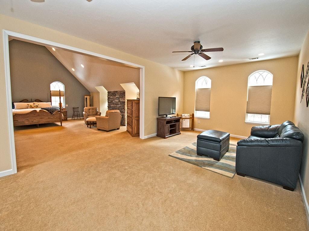 835 Old Mill Road Fox Chapel, PA 15238 - Photo 15 of 25 The owner's suite has a large sitting room, vaulted ceilings, his and her's closets, wonderful bath with elevated jacuzzi tub.