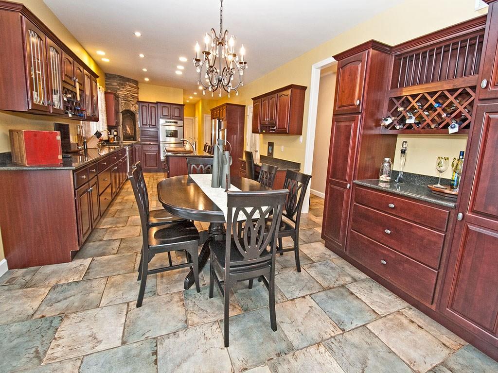 835 Old Mill Road Fox Chapel, PA 15238 - Photo 5 of 25 The casual dining area, with extra storage and wine racks.