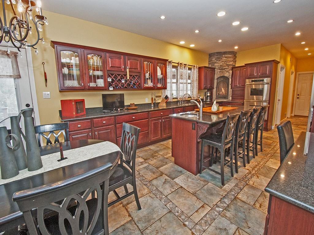 835 Old Mill Road Fox Chapel, PA 15238 - Photo 6 of 25 Fully equipped with fireplace. Door to covered Trex deck.