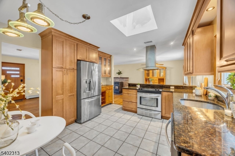 128 Old Croton Road Flemington, NJ 08822 - Photo 12 of 35 a kitchen with a refrigerator a stove top oven a sink and dishwasher