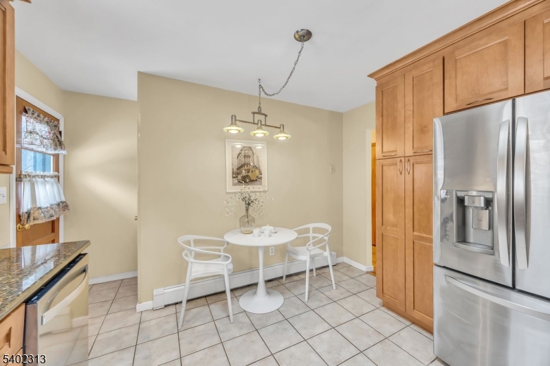128 Old Croton Road Flemington, NJ 08822 - Photo 14 of 35 a kitchen with stainless steel appliances granite countertop a refrigerator and a stove top oven