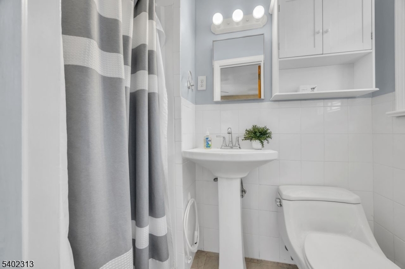 128 Old Croton Road Flemington, NJ 08822 - Photo 20 of 35 a bathroom with a sink toilet and mirror