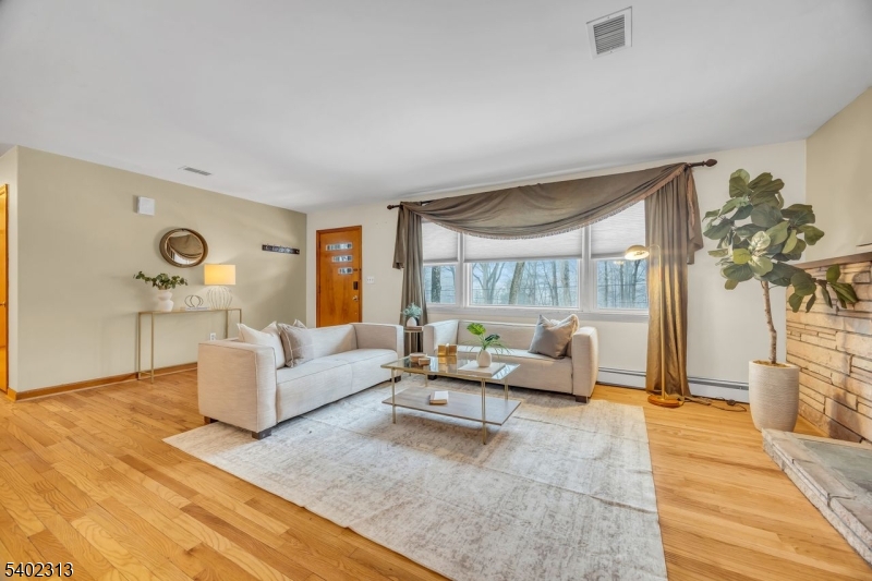 128 Old Croton Road Flemington, NJ 08822 - Photo 5 of 35 a living room with furniture and a large window