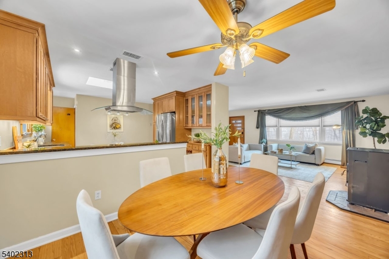 128 Old Croton Road Flemington, NJ 08822 - Photo 10 of 35 a view of a dining room with furniture and wooden floor