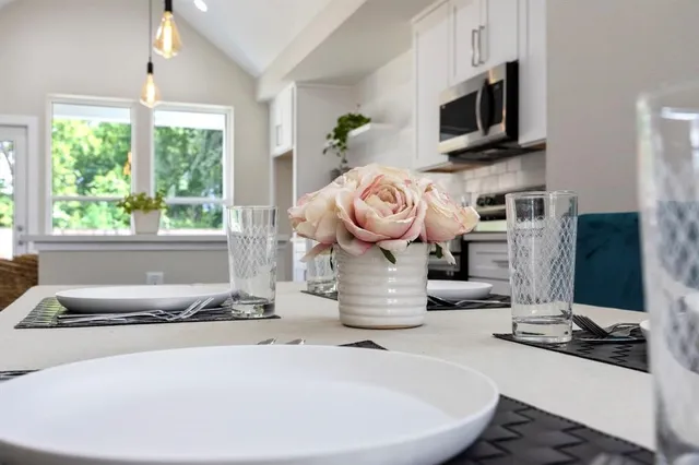 a room with fireplace furniture and a window