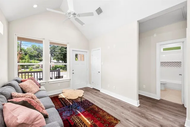 a bed room with a bed and a window