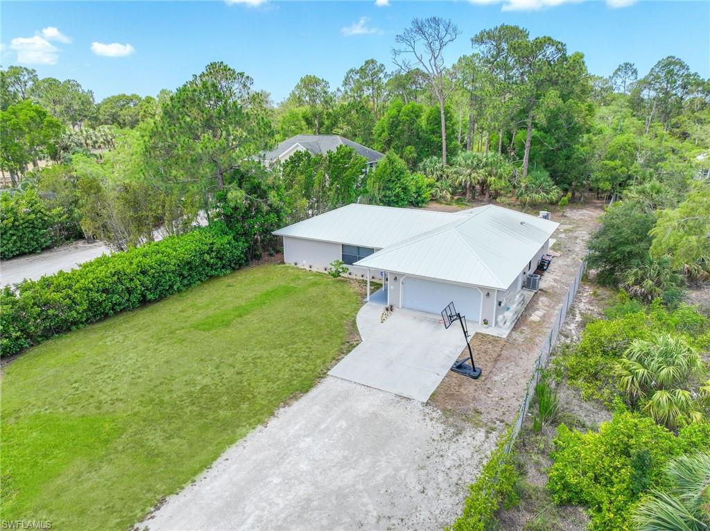 3221 68th Street Southwest Naples, FL 34105 - Photo 36 of 38 an aerial view of a house