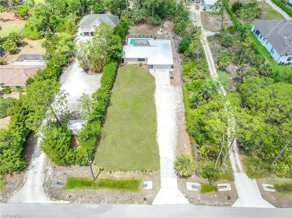 3221 68th Street Southwest Naples, FL 34105 - Photo 37 of 38 an aerial view of a house