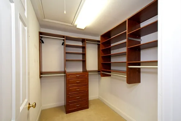 a view of a room with racks on the wall
