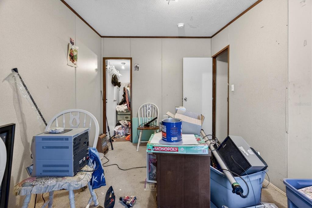 5083 Southeast 70th Loop Ocala, FL 34480 - Photo 16 of 34 a view of living room with furniture and rug