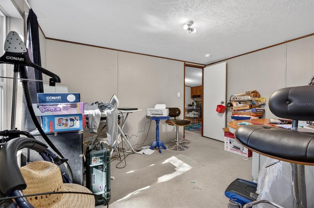 5083 Southeast 70th Loop Ocala, FL 34480 - Photo 17 of 34 a view of a room with gym equipment