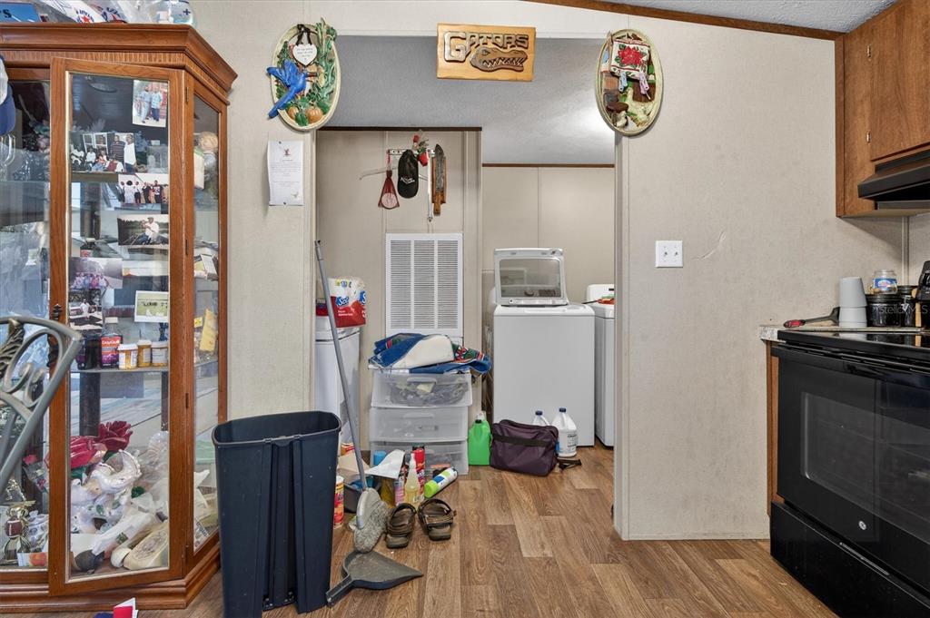 5083 Southeast 70th Loop Ocala, FL 34480 - Photo 19 of 34 a living room with furniture and a flat screen tv