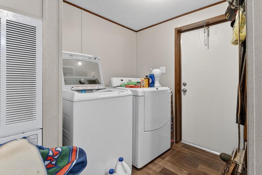 5083 Southeast 70th Loop Ocala, FL 34480 - Photo 20 of 34 a room with storage and utility