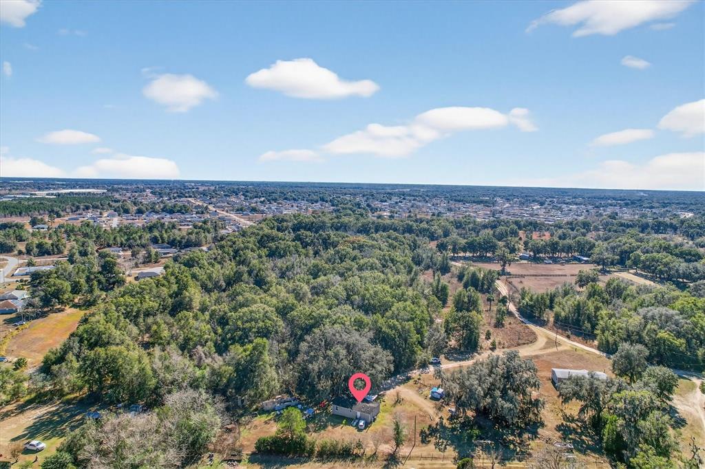 5083 Southeast 70th Loop Ocala, FL 34480 - Photo 27 of 34 an aerial view of a city