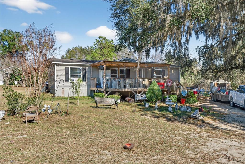 5083 Southeast 70th Loop Ocala, FL 34480 - Photo 4 of 34 a view of outdoor space yard and porch