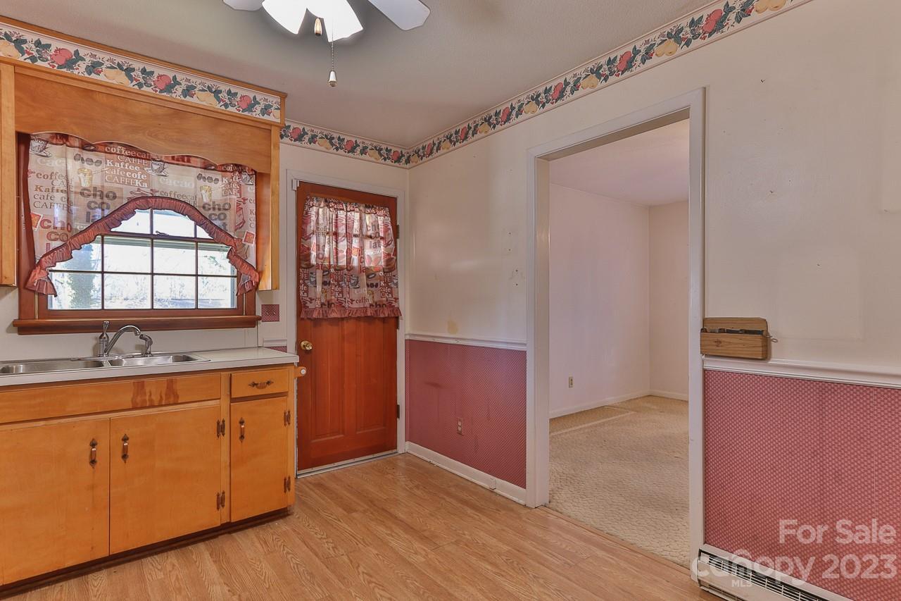 4081 Section House Road Hickory, NC 28601 - Photo 14 of 48 a view of cabinets with wooden floor